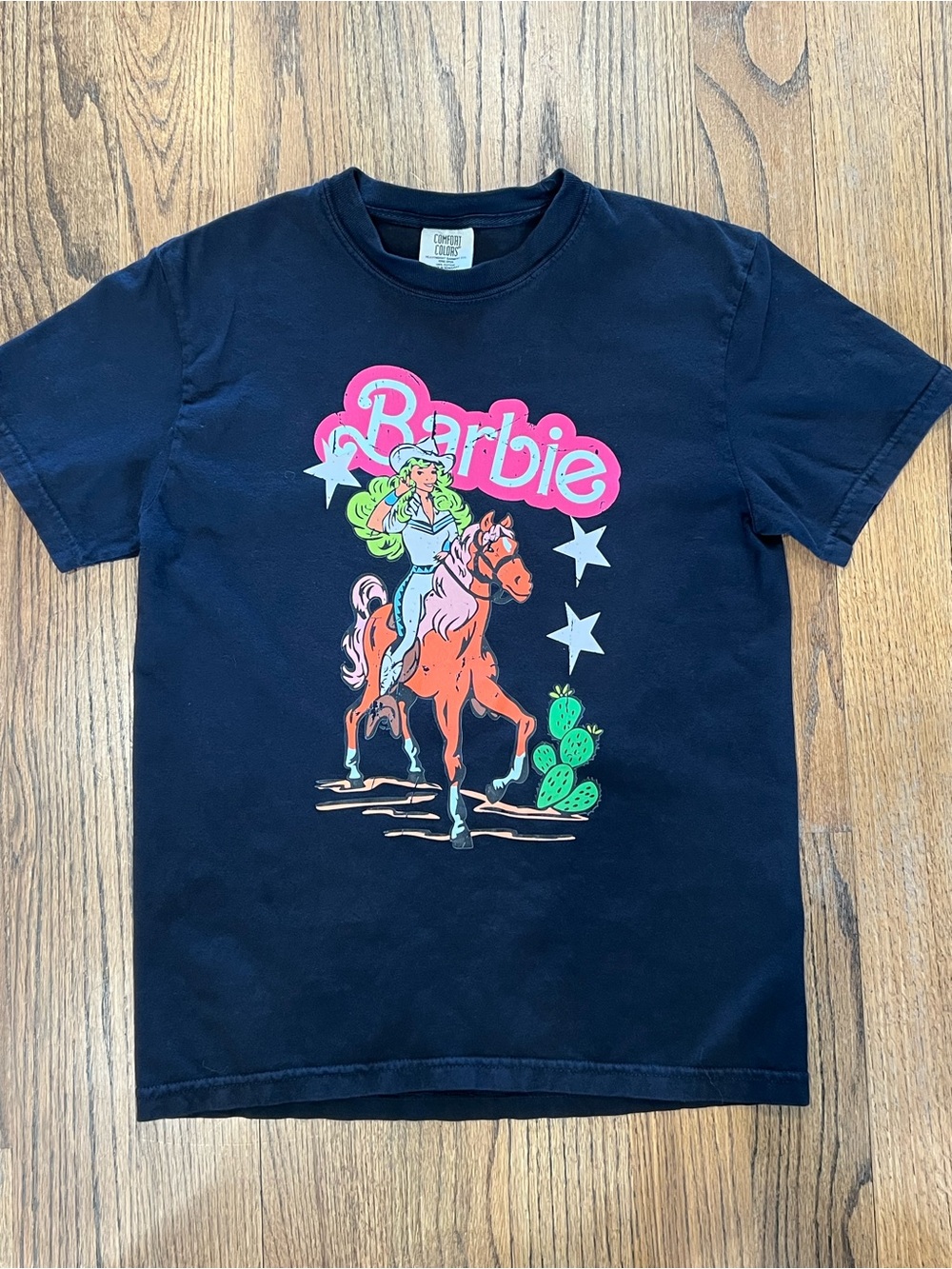 Comfort Colors Black Tee with Pink Barbie Logo and Multicolor Graphic
